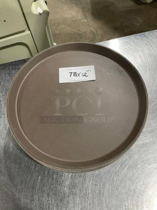 Commercial round brown serving tray for fast food, 12 units. Durable design, label marked "78X/12".