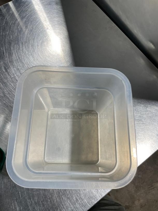 Translucent 3.5 Qt. food storage container with lid, shown open. Durable commercial-grade, ideal for bulk storage.