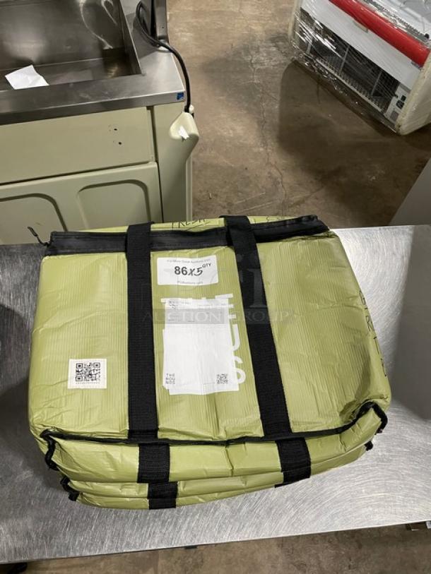 Commercial green insulated food delivery bag, new condition. Features reinforced straps. Includes visible labels with QR code.