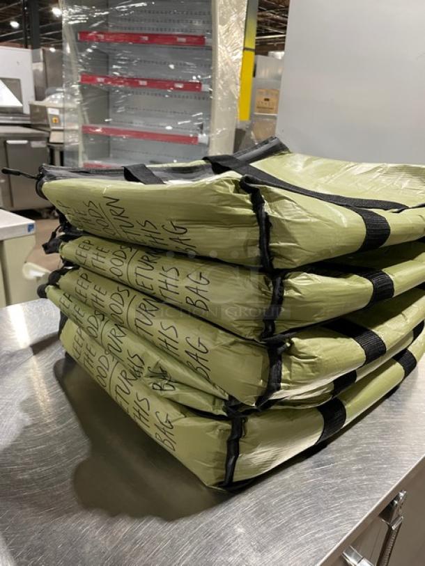 Commercial green insulated delivery bags, new condition, stacked. Durable design for fast food/meal delivery efficiency.