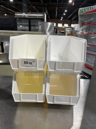 White stackable condiment/utensil bins, commercial countertop use, excellent condition. Visible label: "88X4" indicating quantity.