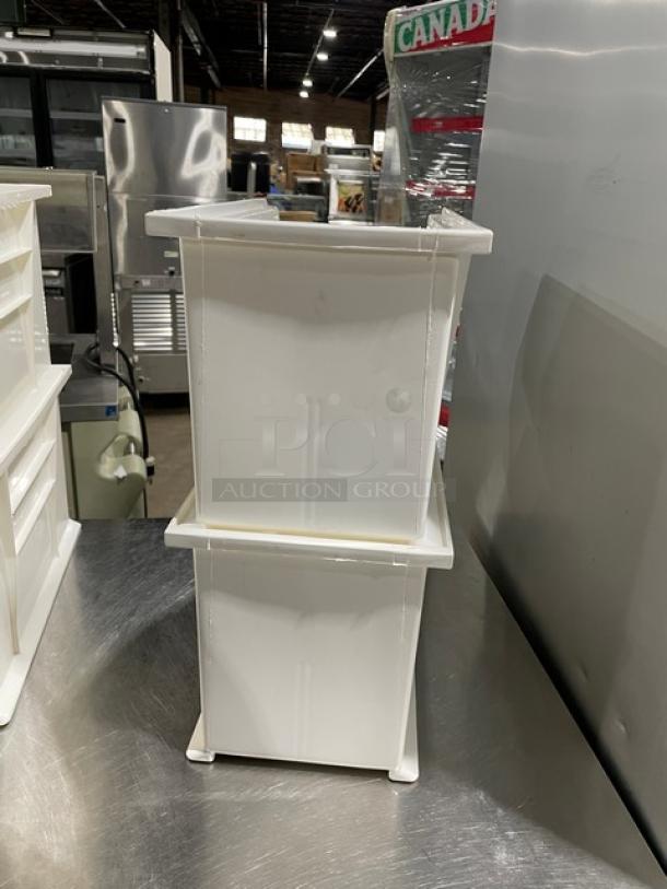 White stackable countertop condiment/utensil bin in commercial setting, excellent condition. Ideal for organization.
