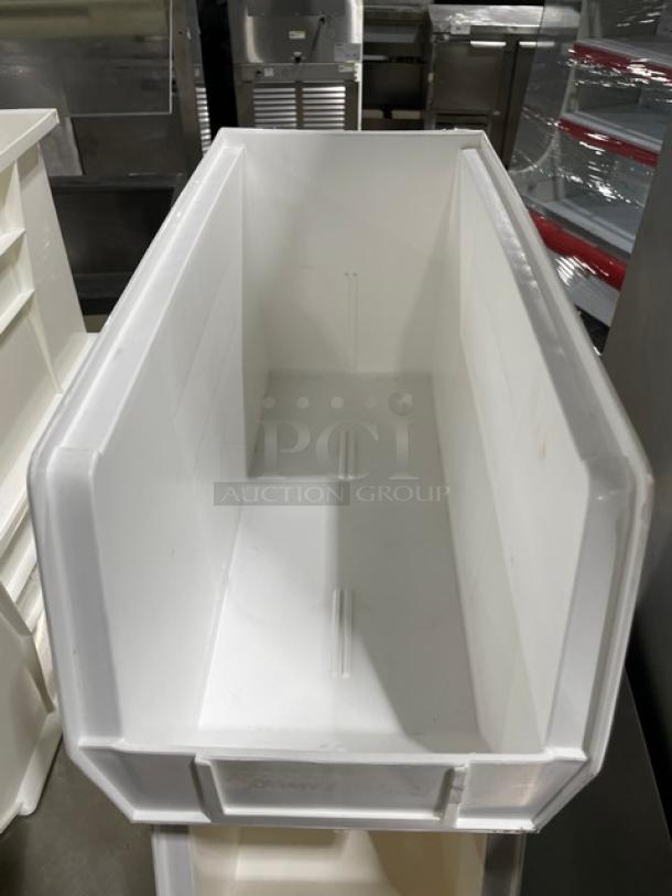 White countertop stackable condiment/utensil organizing bin, commercial-grade, pristine condition, ideal for efficient storage.