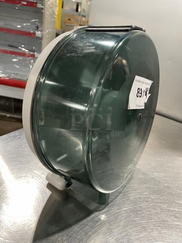 Wisconsin Tissue smoke gray paper roll dispenser, commercial size, clear cover, white trim, minor scratches, label "89".