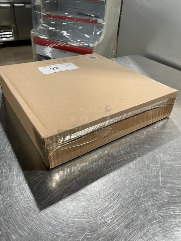 Brand new Thunder Group stainless steel knife rack, model SLKR012, in sealed cardboard packaging.