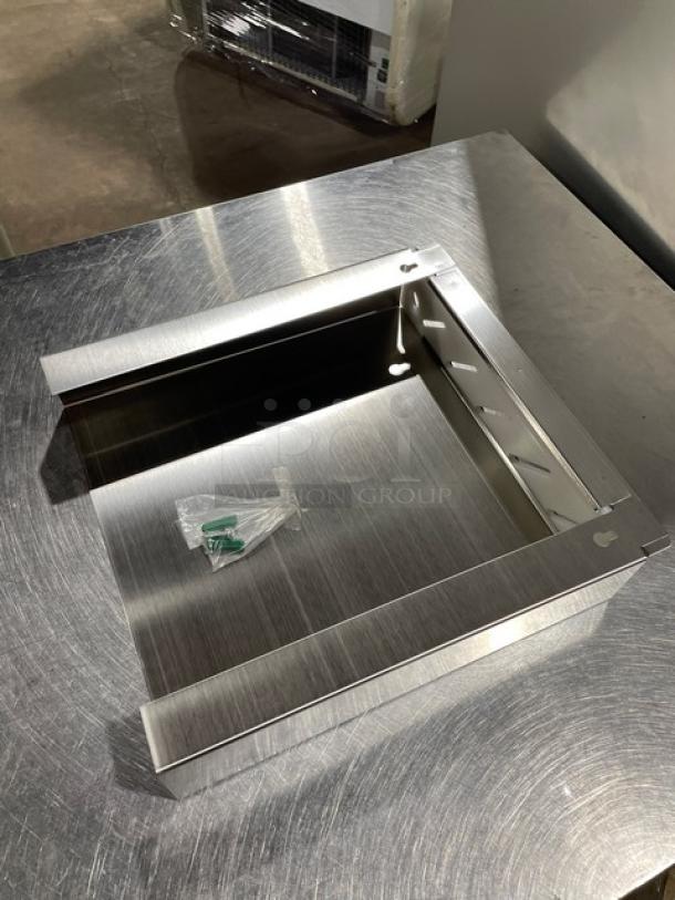 Brand new Thunder Group stainless steel knife rack, model SLKR012, with mounting hardware.