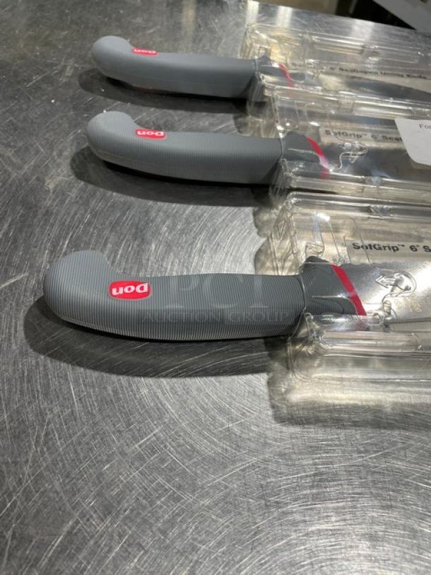 Brand new Don SofGrip 6" scalloped utility knife, model 1141930, with gray grip handle in original packaging.