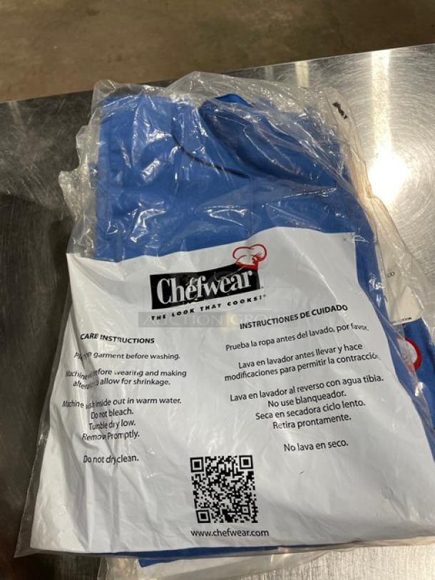 Brand new Chefwear blue bar jacket, size small, model 4931, lightweight, single-breasted, in original packaging.