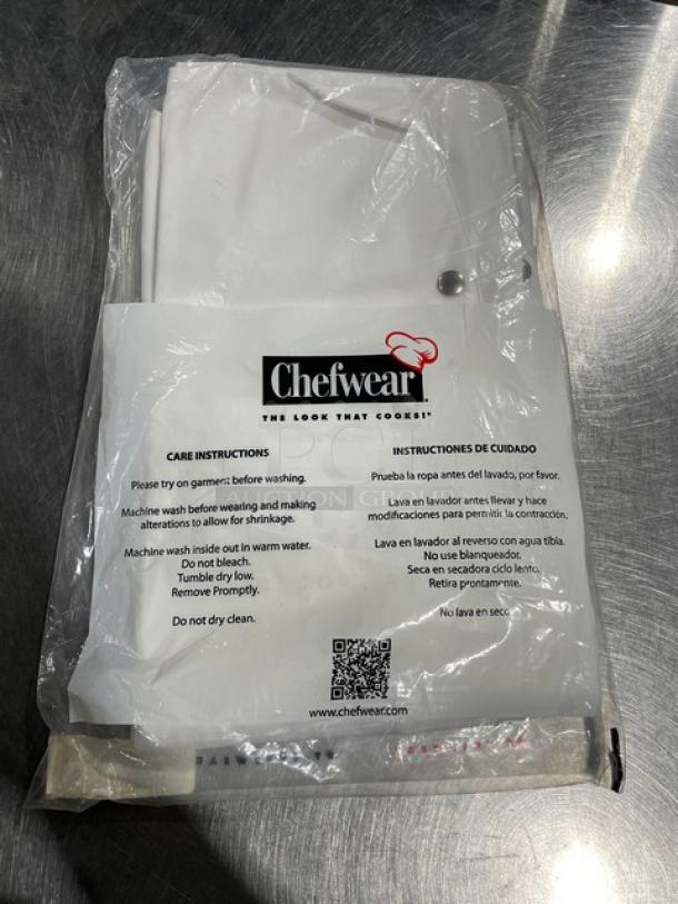 Brand new Chefwear XS-size 4 Star Snap Chef Jacket, model 5620-40-XS, sealed in packaging. Includes care instructions.
