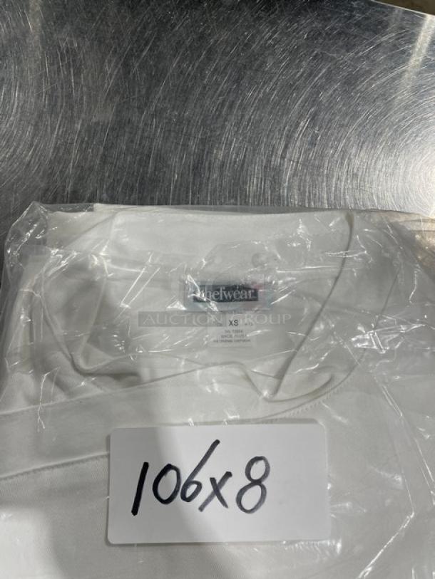 Brand new Chefwear XS white Chef Jacket, Model 5620-40-XS, in packaging. Features star snaps, tag indicates size XS.