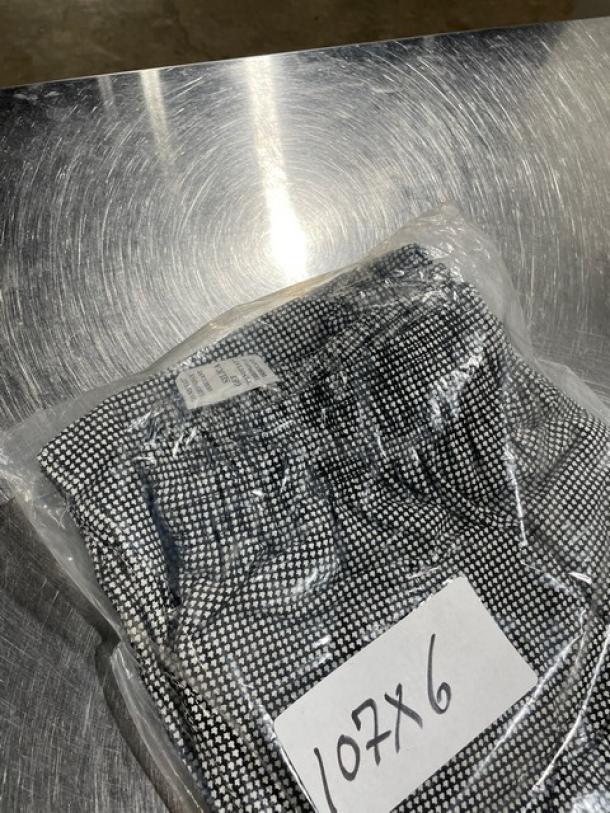 Brand new Chefwear Cargo Chef Pants, Model 3200114X, sealed in plastic. Black and white check pattern, size 4X.