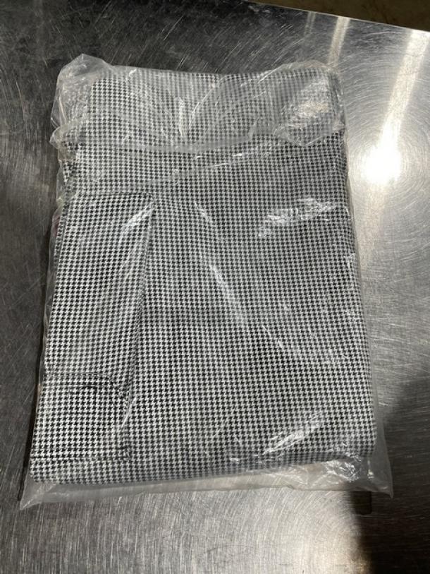 Brand new Chefwear CW11 3X-size chef pants in packaging, black and white checkered pattern, pristine condition.