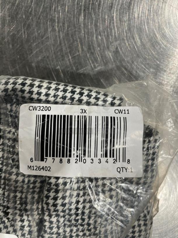 Brand new Chefwear CW11 chef pants, size 3X. Houndstooth pattern, barcode tag indicates model and size.