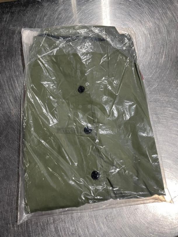 Brand new Chefwear CW214 green medium-size chef shirt, sealed in original packaging, featuring button-up design.