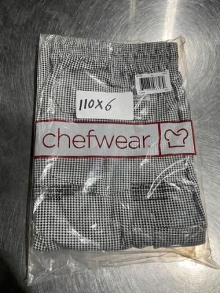 Brand new Chefwear CW11 XL chef pants in bag. Houndstooth pattern, barcode label, marked "110X6".