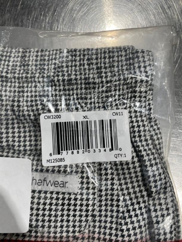 Brand new Chefwear CW11 commercial chef pants, XL size, in packaging. Black and white check pattern. Model: CW3200.