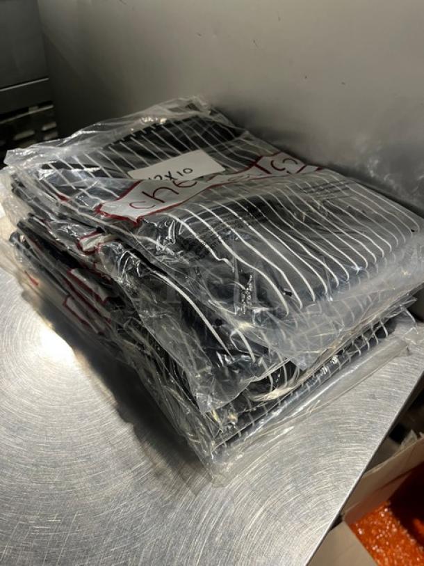Brand new Chefwear CW35 black chalk-stripe chef pants in original packaging, multiple pairs labeled "10X".