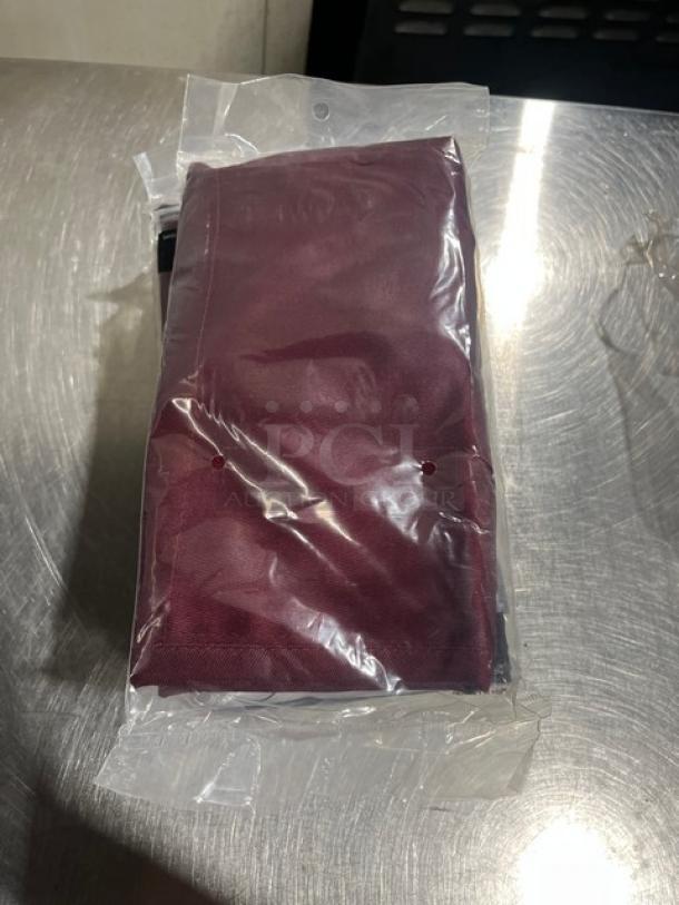 Brand new Chef Revival burgundy bib apron, model 612BAFHBG, in original packaging. Features 3 lower pockets.