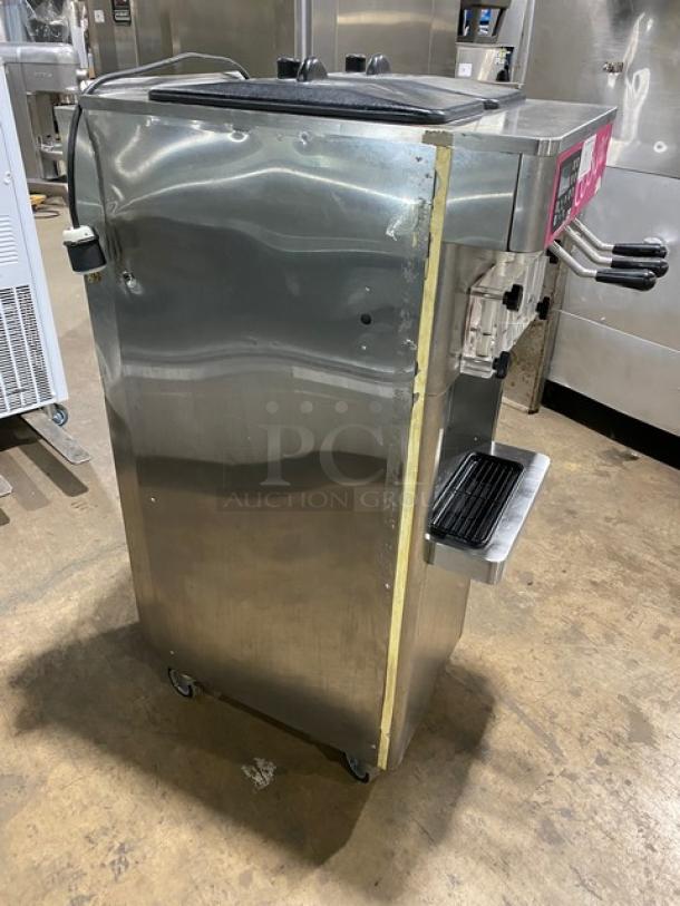 Stoelting F231-30912P-AD1 stainless steel ice cream machine, twin/twist flavors, 2 hoppers, drip tray, on casters, 208-240V 3 phase.