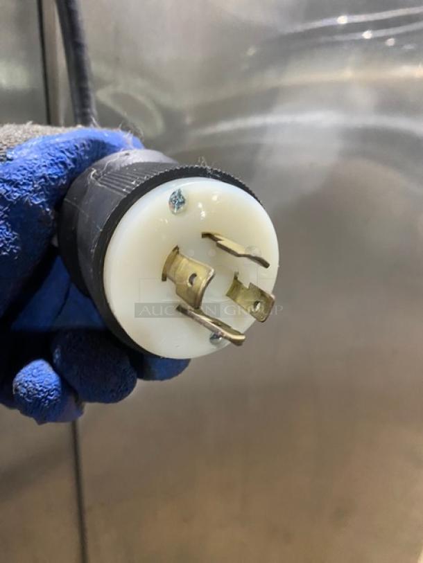 Close-up of a power plug for a Stoelting Model F23130912PAD1 soft serve machine. 208-240V, 3-phase connector.