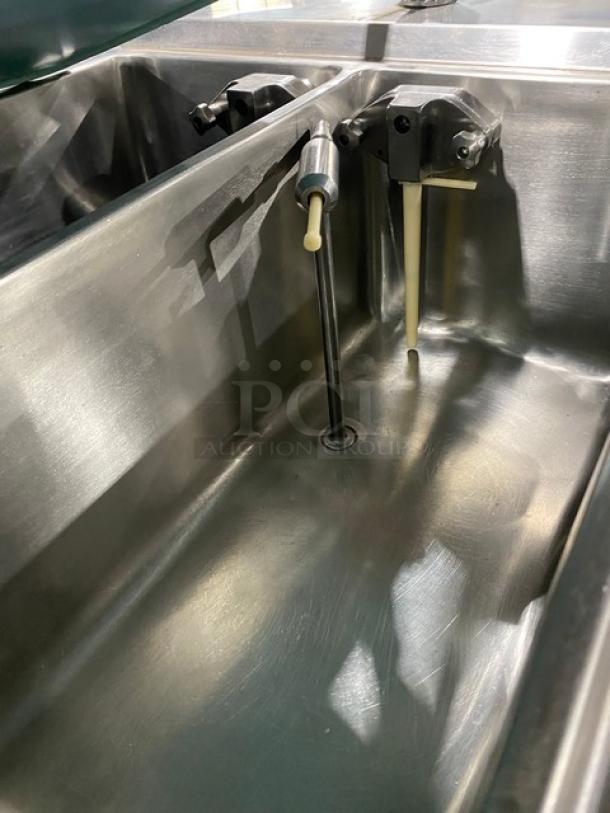 ColdElite UF8202 twin/twist soft serve machine, stainless steel interior, on casters, 208V, 3-phase, excellent condition.
