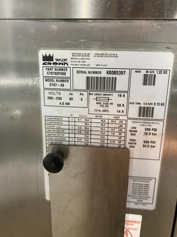 Taylor C707-33 stainless steel soft serve machine, electric, single flavor, single hopper. Label shows serial K8085397, 208-230V, 3 phase.