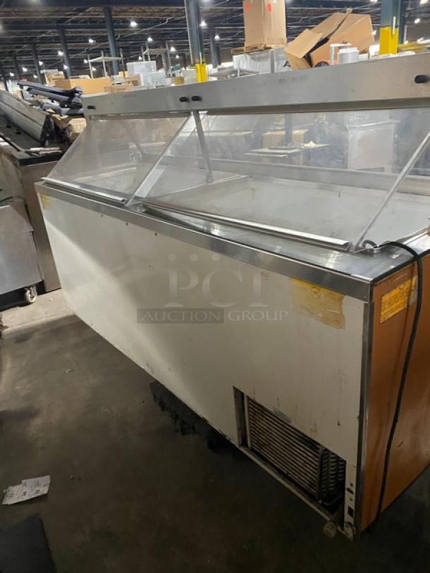 Beverage-Air ice cream/frozen yogurt dipping cabinet with sneeze guard, rear double lift-up doors, in used condition.