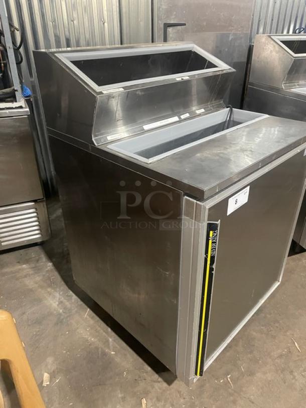 Silver King stainless steel refrigerated ice cream topping fountainette, model SKFSM/C7, 115V, on casters, good condition.
