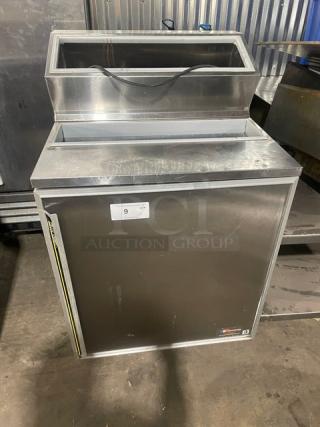 Silver King SKFSM/C7 stainless steel refrigerated workstation, single door, poly coated racks, model HLDP151777A, on casters.