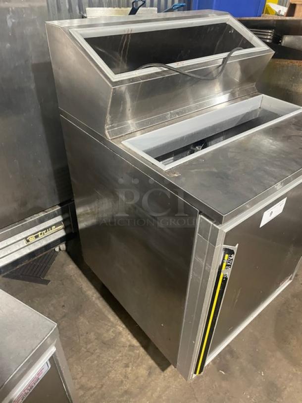 Silver King SKFSM/C7 stainless steel topping fountainette, one door, casters, poly coated wire racks, model tag visible.