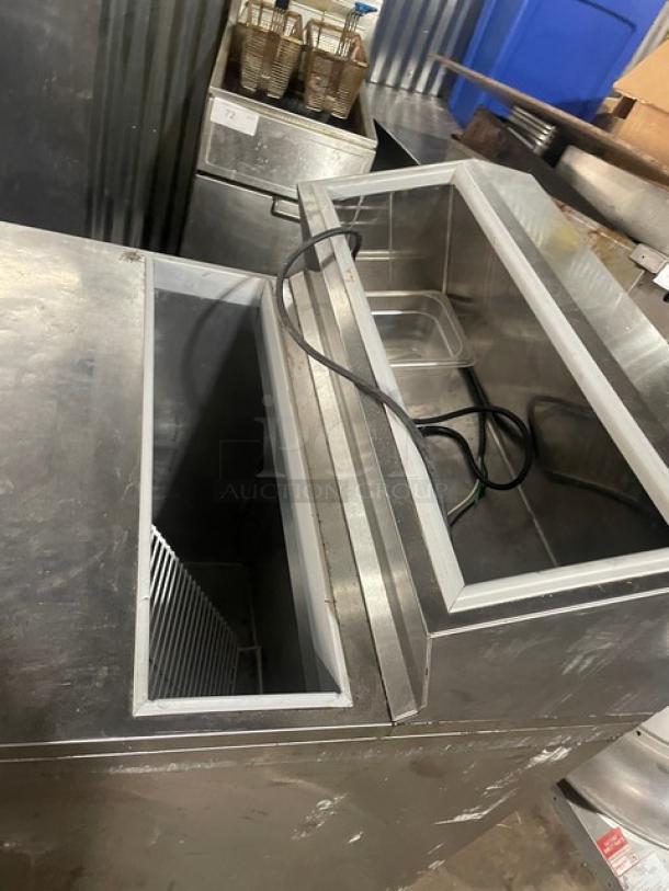 Silver King SKFSM/C7 stainless steel refrigerated workstation for ice cream toppings, features poly-coated racks, 115V, on casters.