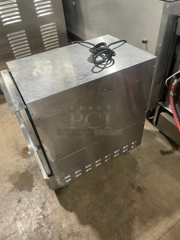 Winston CVap Series stainless steel warming cabinet, 2 drawers, electric, on casters, model 2020, 120V, SN: 20200115-0139.