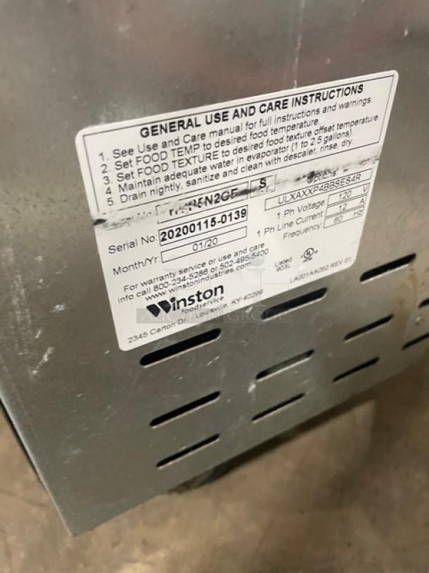 Winston CVap Series warming cabinet label showing model, serial number 20200115-0139, and care instructions.