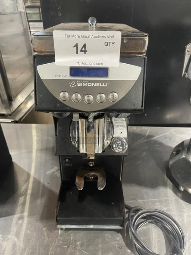 Nuova Simonelli Mythos Silent espresso grinder, 2018 model, black, electric, countertop, SN: NS0011845527486, on legs.