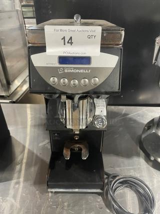Nuova Simonelli Mythos Silent espresso grinder, 2018 model, black, electric, countertop, SN: NS0011845527486, on legs.
