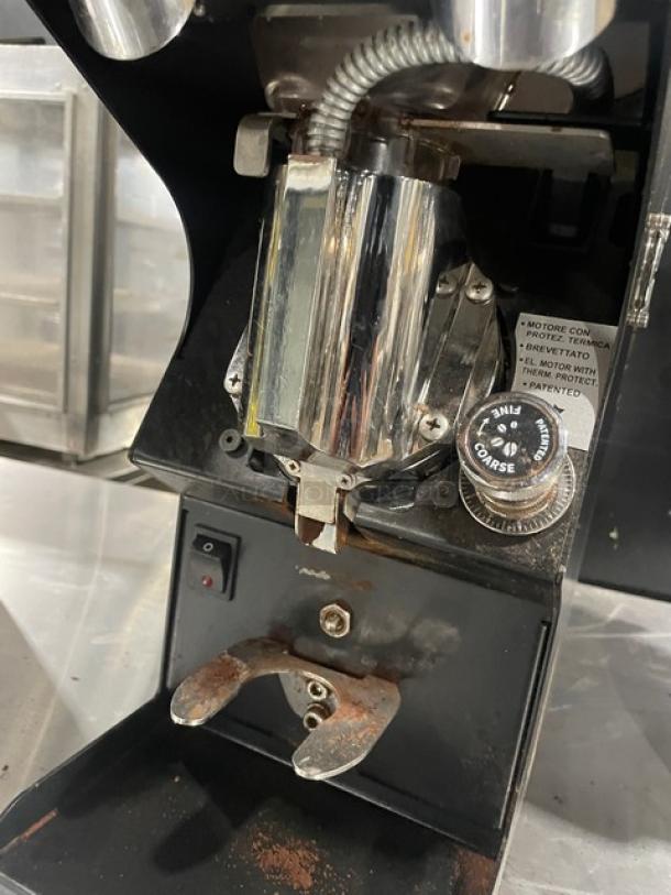 Nuova Simonelli Mythos Silent espresso grinder, black, countertop model, electric 110-120V, on legs, used condition.
