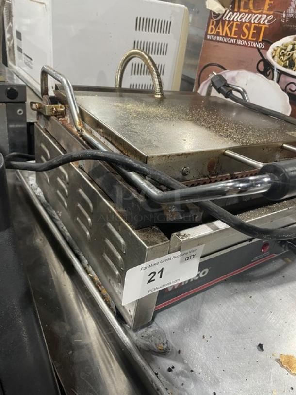 Winco EPG1C stainless steel electric single panini grill with grooved grates, countertop model, 120V, used condition.