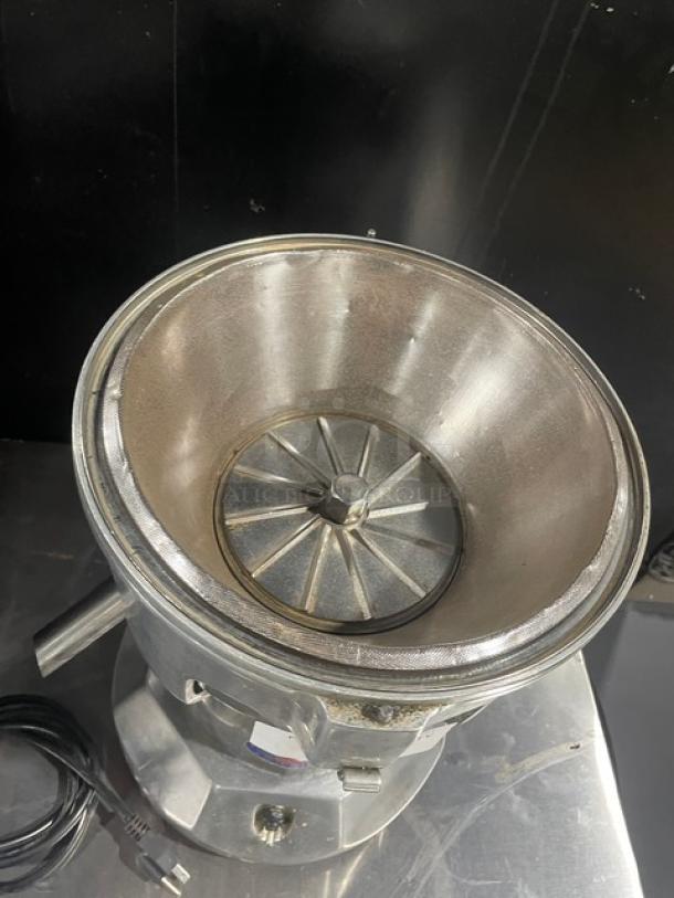 Ruby 2000 stainless steel juice extractor; electric powered, heavy-duty, on legs, model SN: 7681, 115-117V, 1 phase.