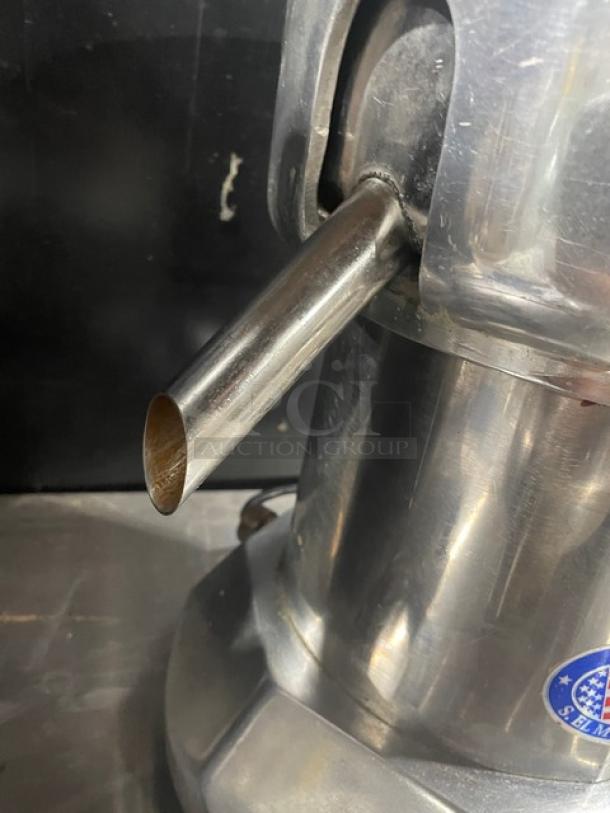 Ruby 2000 commercial juice extractor, stainless steel, electric, countertop design, on legs, model RUBY2000, SN: 7681.