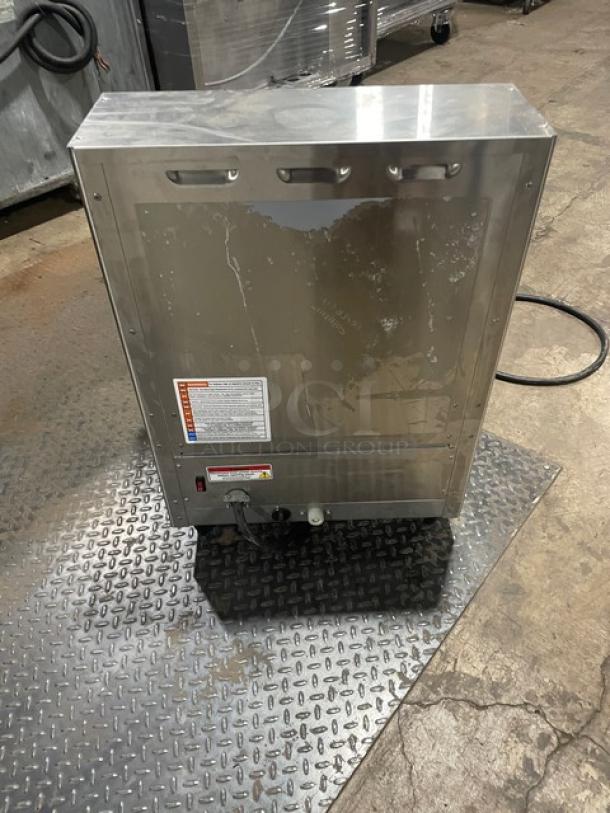 Fetco CBS-2132-XTS coffee brewer, stainless steel, hot water dispenser, portable server; late model, condition visible in image.