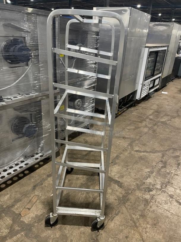 Channel SRS-7 aluminum slanted display rack, on casters, in good condition. Suitable for commercial use.