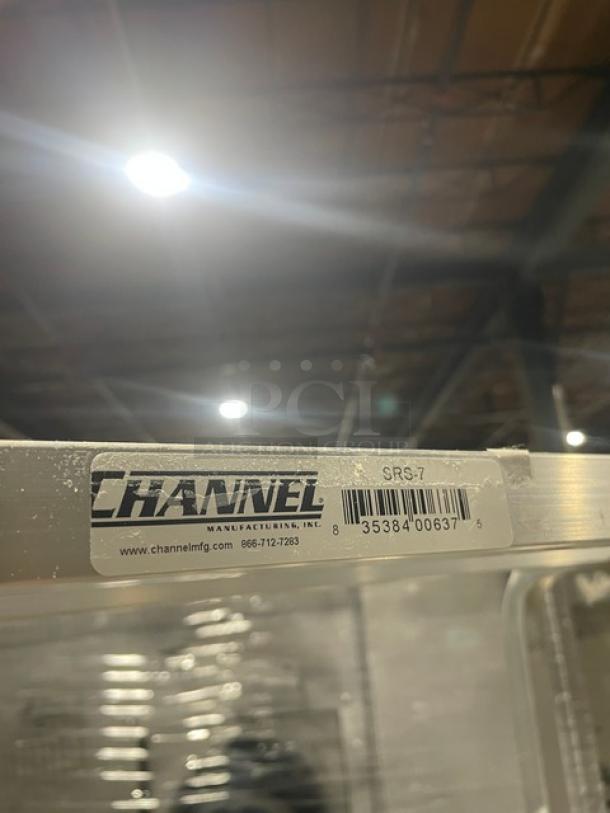 Channel Commercial Aluminum Slanted Display Rack SRS-7 on casters, metal construction, visible maker's label and barcode.