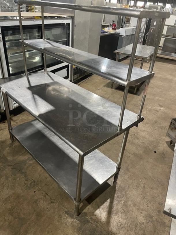 Sapphire stainless steel worktop table, features a single undershelf and double overhead shelves, sturdy legs, commercial use.