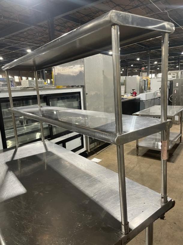 Sapphire stainless steel worktop table with single undershelf and double overhead shelves, on legs, commercial use.
