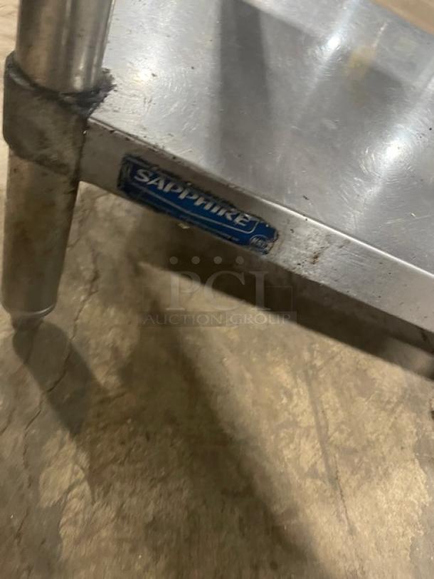 Sapphire stainless steel worktop table with single undershelf and double overhead shelf, visible brand logo.