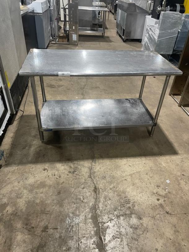 Sapphire stainless steel worktop table with undershelf. Commercial use, sturdy legs, good condition, ideal for kitchen setup.