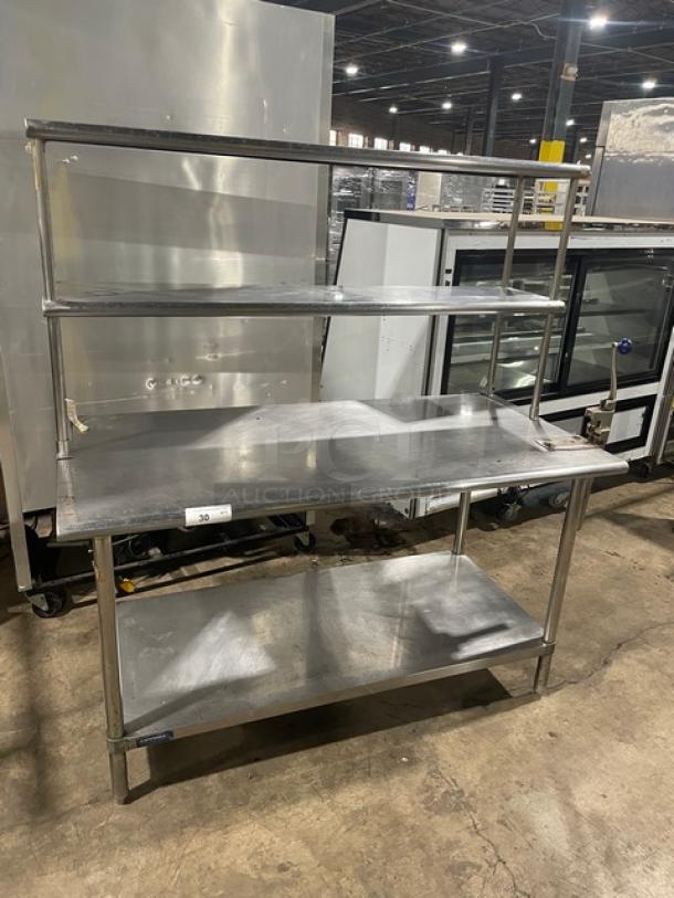 Sapphire stainless steel worktop table with dual overhead shelves, undershelf, and Edlund manual can opener. Commercial-grade on legs.
