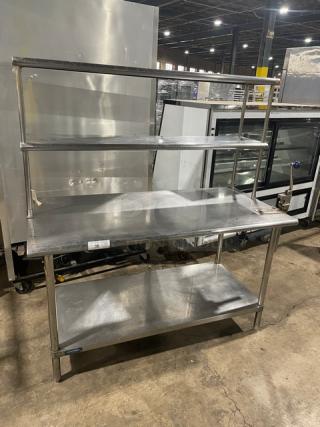 Sapphire stainless steel worktop table with dual overhead shelves, undershelf, and Edlund manual can opener. Commercial-grade on legs.