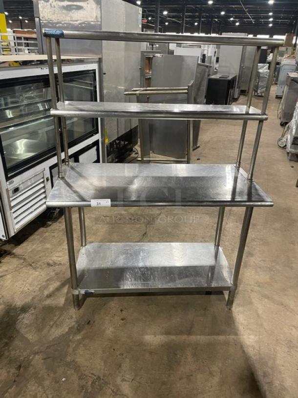 Sapphire stainless steel worktop table with single undershelf and double overhead shelf. On sturdy legs, commercial-grade condition.