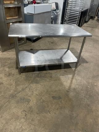 Sapphire stainless steel worktop table with undershelf on legs; commercial grade, sturdy condition, ideal for kitchen use.